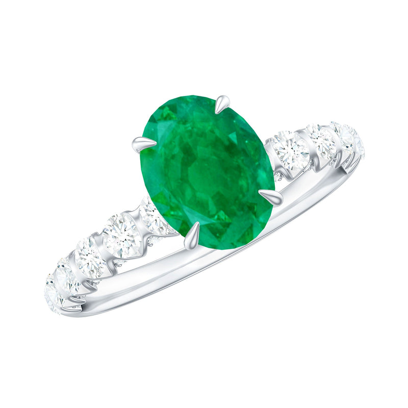 Oval Emerald & Diamond Side Stone Ring