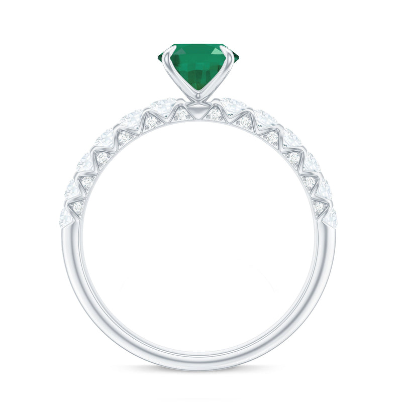 Oval Emerald & Diamond Side Stone Ring