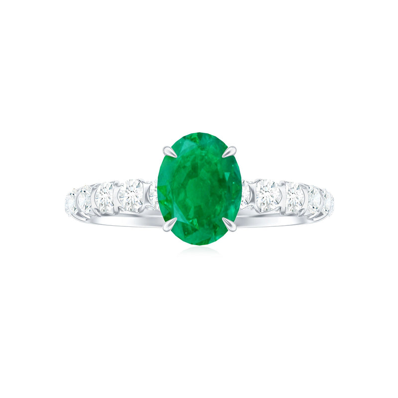 Oval Emerald & Diamond Side Stone Ring