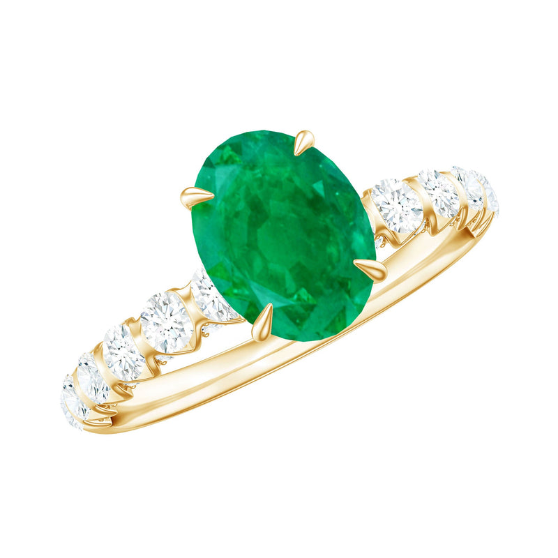 Oval Emerald & Diamond Side Stone Ring