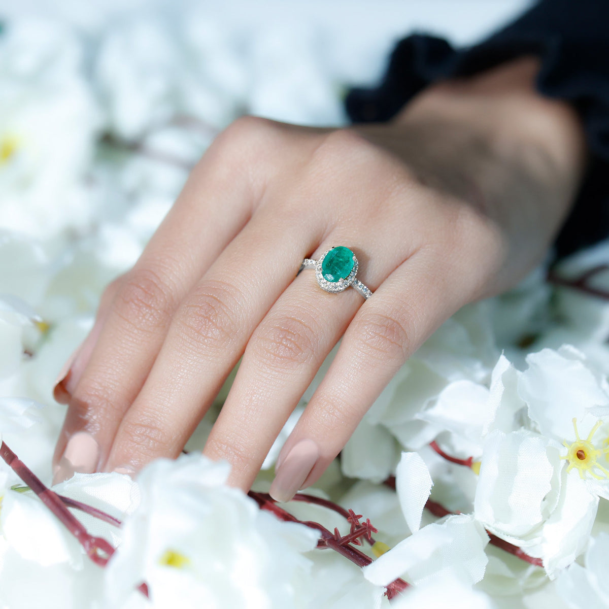 Oval Emerald & Diamond Halo Ring