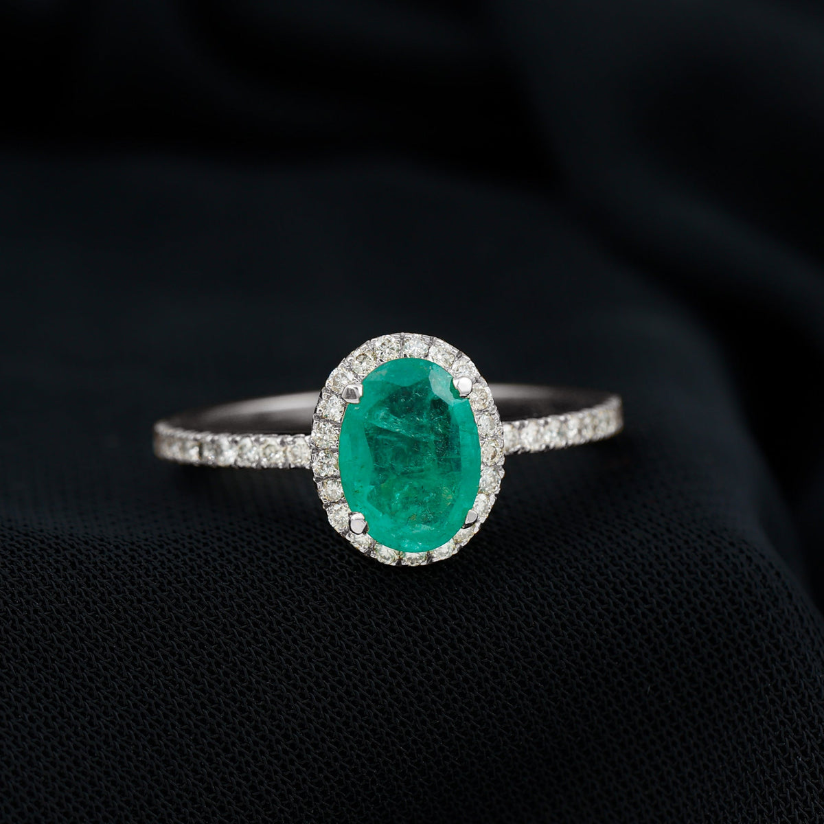Oval Emerald & Diamond Halo Ring