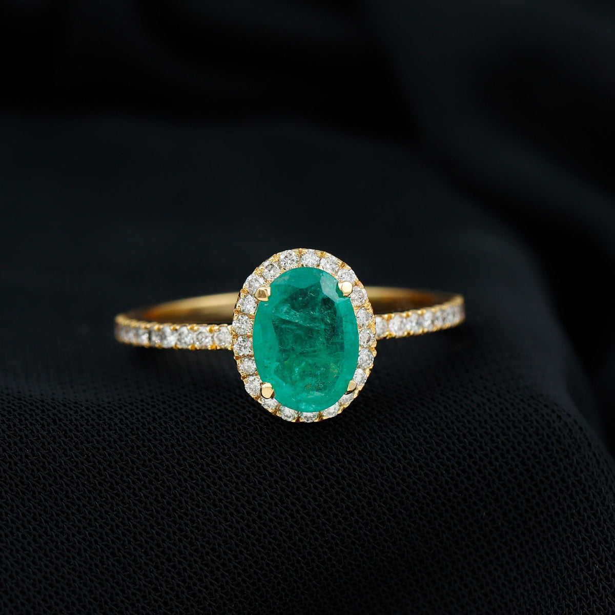 Oval Emerald & Diamond Halo Ring